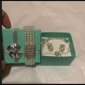 Three different set of pearl accessories